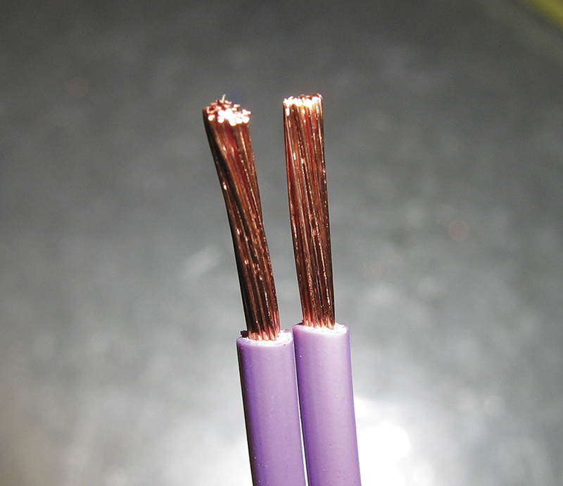 Strip equal lengths of insulation from the ends of the wires. Only solder clean bright wire.