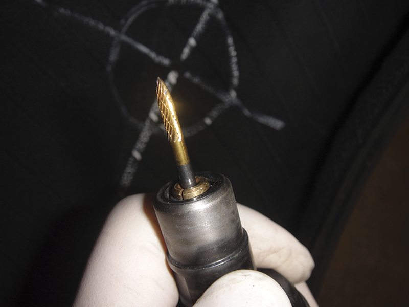Use an appropriately-sized carbide bit to clean the channel.