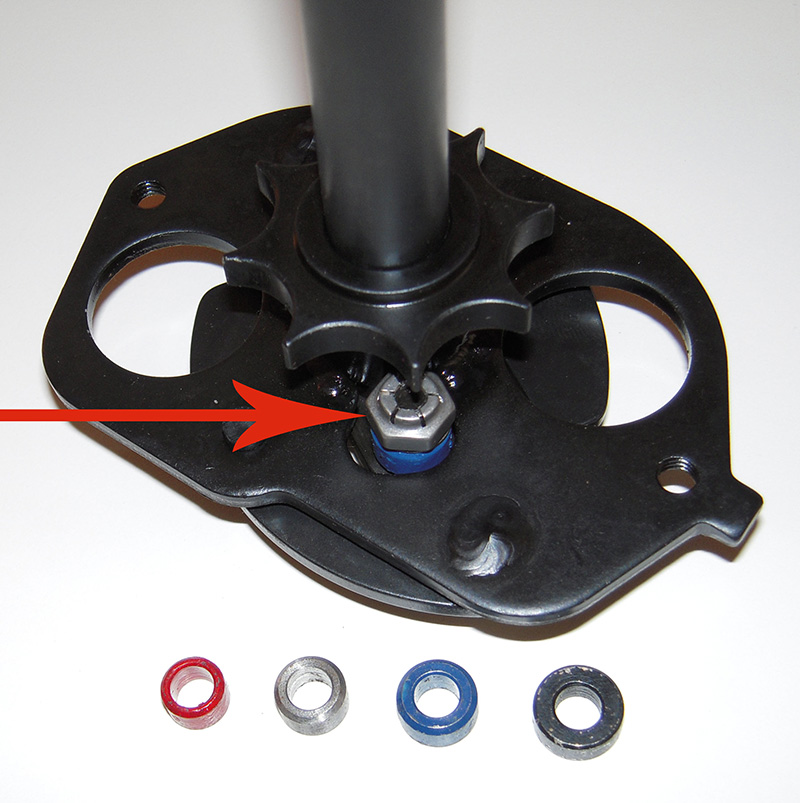 The arrow points to the advance bushing that limits the advance of an MSD distributor.