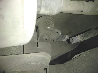 Cracked hose at roll over valve.