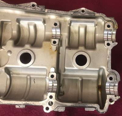 bearing-surfaces-machined-into-camshaft-valve-cover